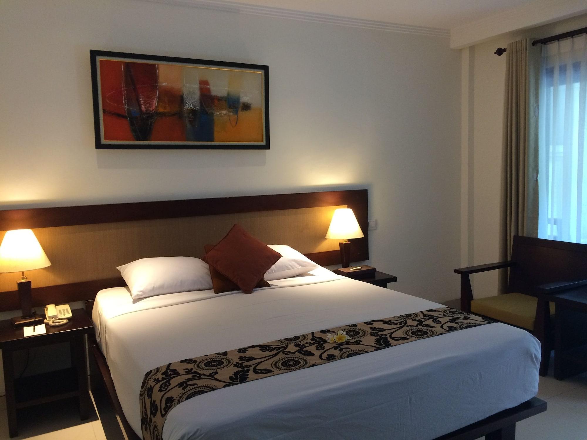 Puri Raja Hotel Legian Extérieur photo
