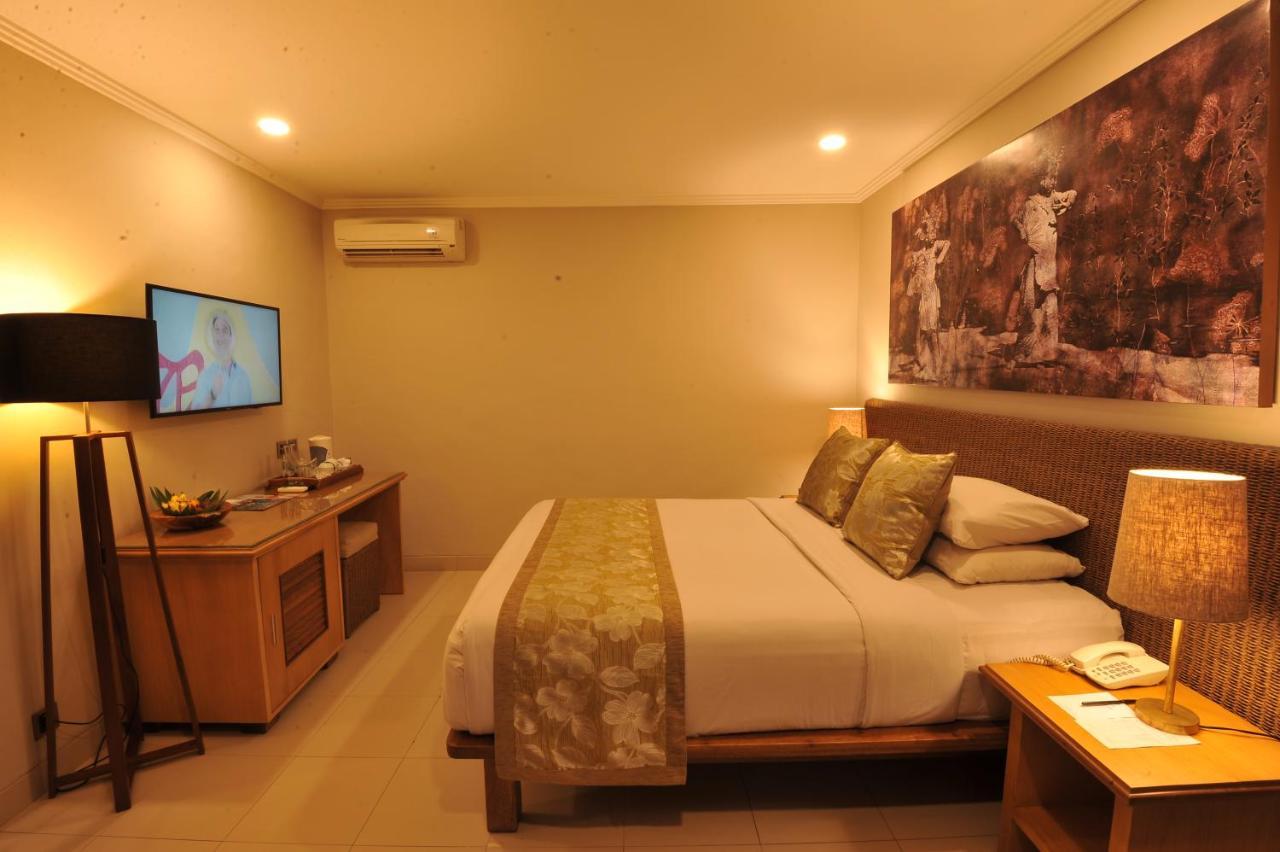 Puri Raja Hotel Legian Extérieur photo
