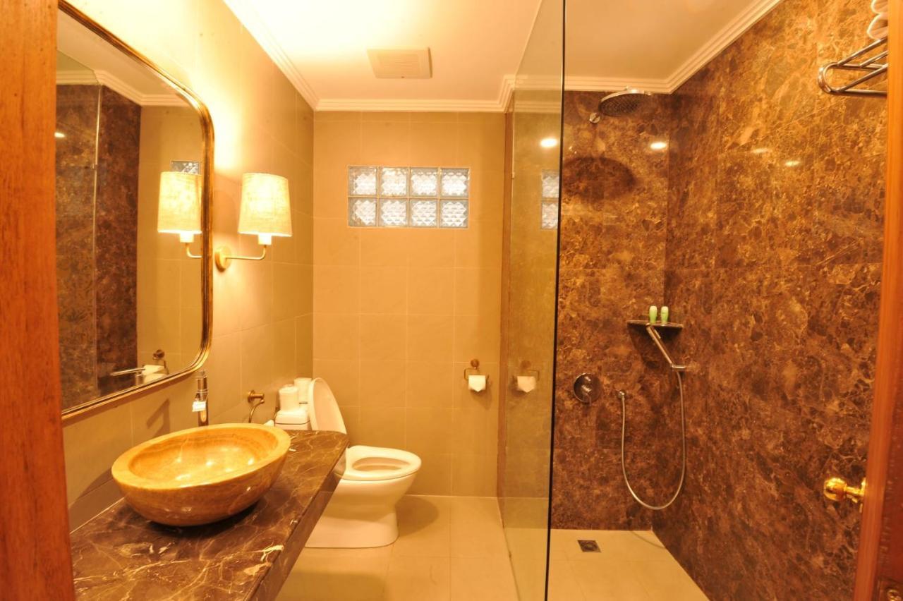Puri Raja Hotel Legian Extérieur photo