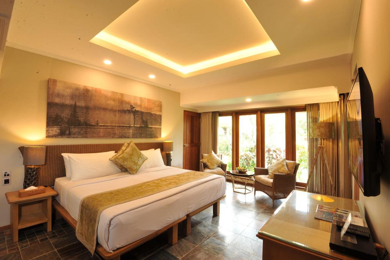 Puri Raja Hotel Legian Extérieur photo