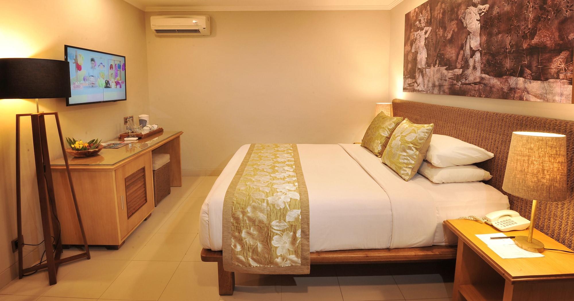 Puri Raja Hotel Legian Extérieur photo