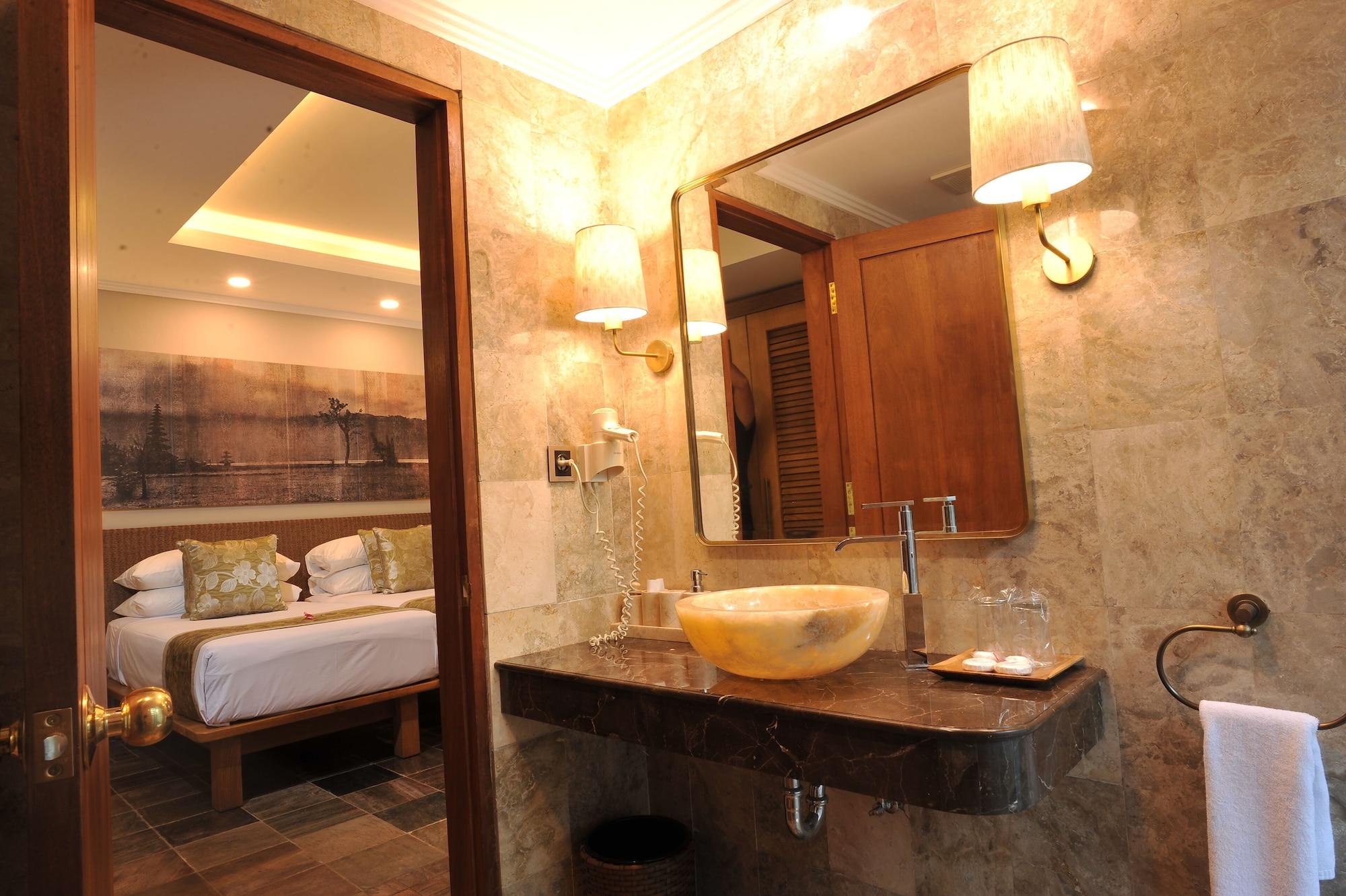 Puri Raja Hotel Legian Extérieur photo