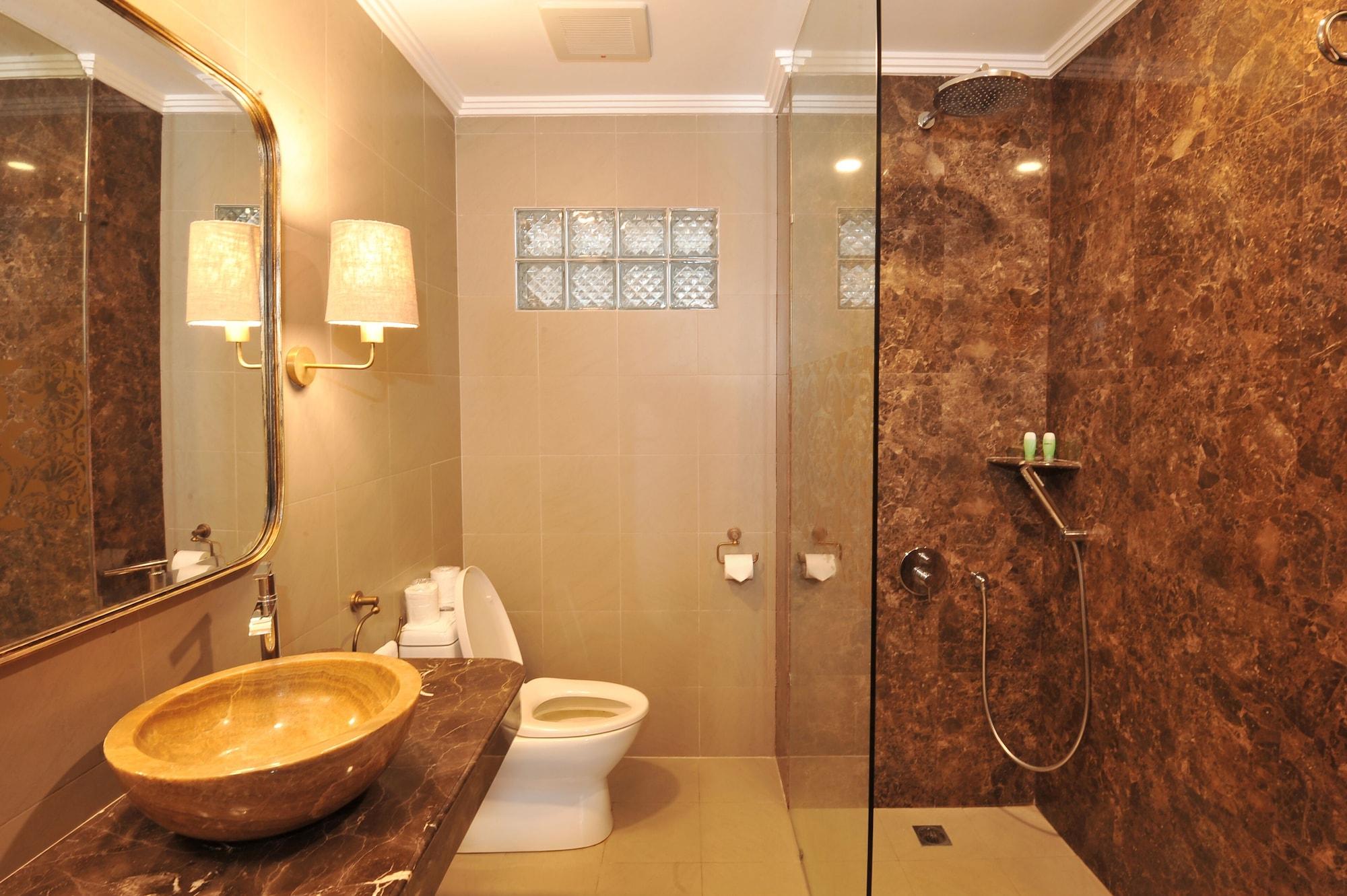 Puri Raja Hotel Legian Extérieur photo