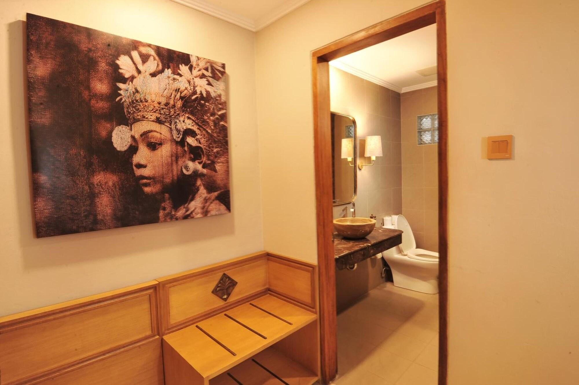 Puri Raja Hotel Legian Extérieur photo