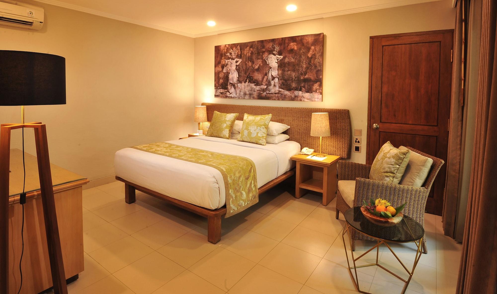 Puri Raja Hotel Legian Extérieur photo