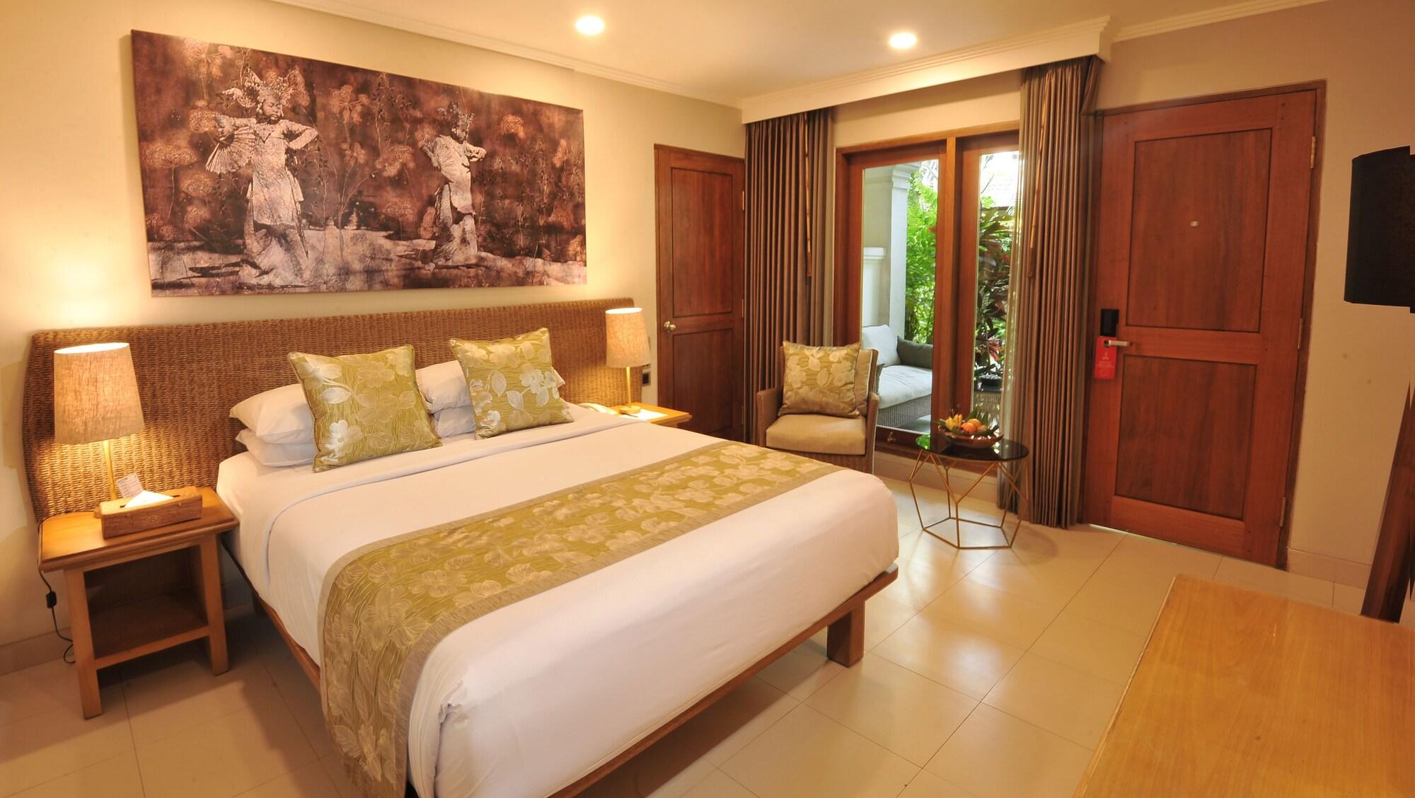 Puri Raja Hotel Legian Extérieur photo