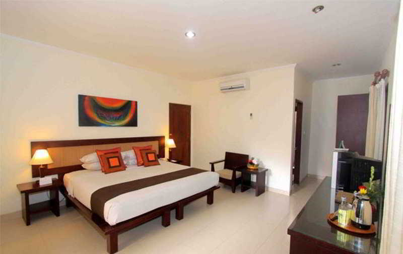 Puri Raja Hotel Legian Extérieur photo